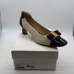 Elegant Black and Cream Heels with Bow Detail